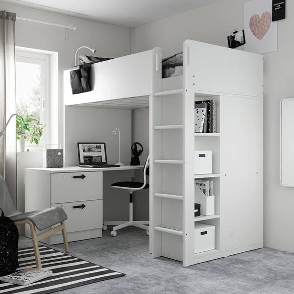 Contemporary kids room with white SMÅSTAD loft bed including desk, wardrobe, and bookcase. Black and white decor.