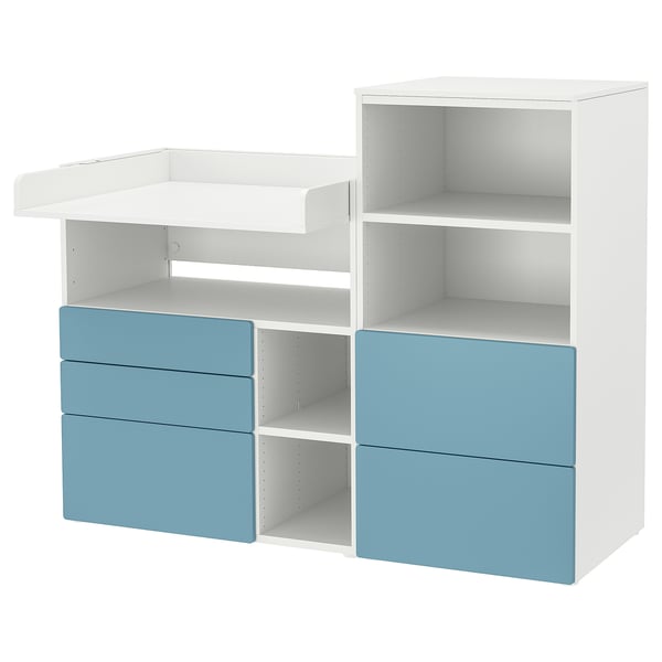 A white and blue childrens storage unit with changing table and shelves.