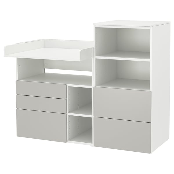 A white SMÅSTAD changing table and storage unit with drawers.