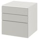 A small white SMÅSTAD chest of drawers with three drawers. Its minimalist design square shapes and smooth surfaces, ideal for storage.