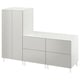 A white SMÅSTAD furniture set, including a cabinet and a chest of drawers with four drawers, designed for children.