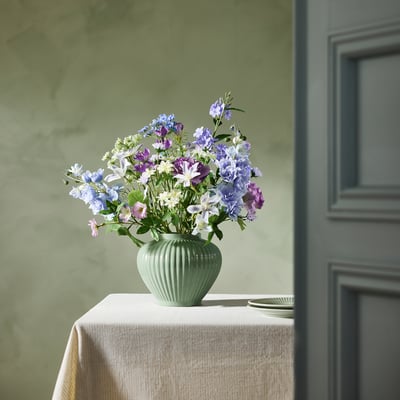 SMYCKA bouquet: purple & blue flowers, green leaves, wrapped with ribbon. Lifelike, artificial, made from recycled materials.