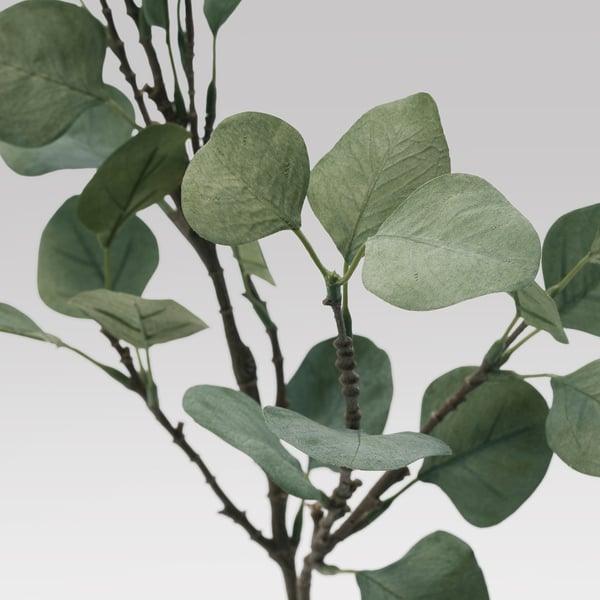 Artificial plant with realistic green leaves.