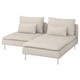 A beige modular sofa, SÖDERHAMN, with a chaise and two large pillows. The sofa has a modern, low-profile design with chrome legs.