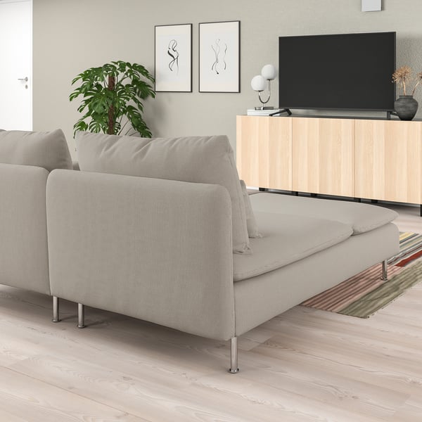 Modern living room with SÖDERHAMN sectional sofa, light grey, sleek design, matched with a tv cabinet and plant.