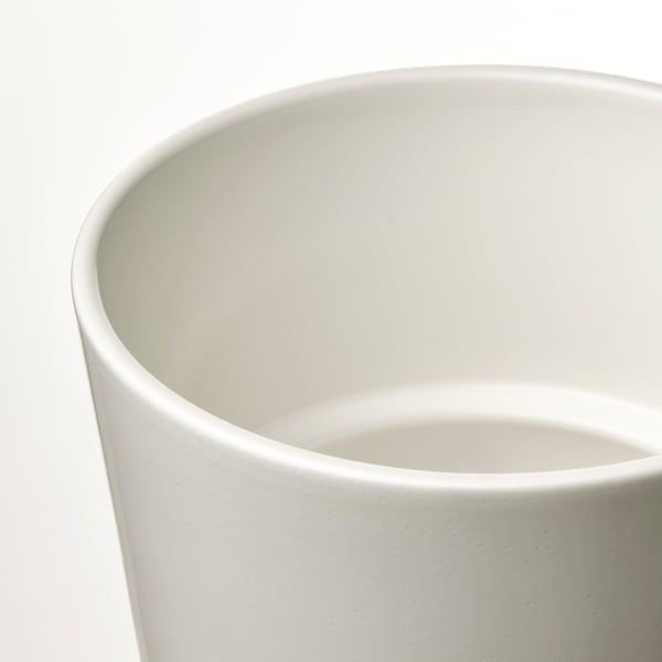 White vase, smooth texture, white background.