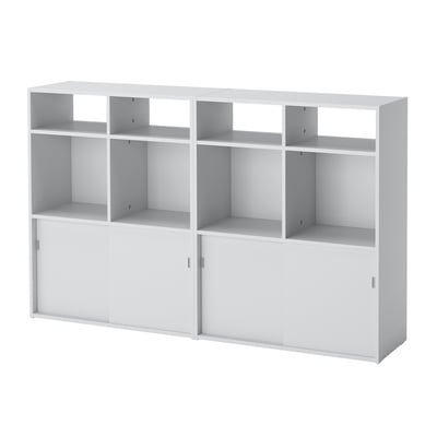 A white, modular SPIKSMED storage unit with multiple compartments and sliding doors, made of particleboard and plastic.