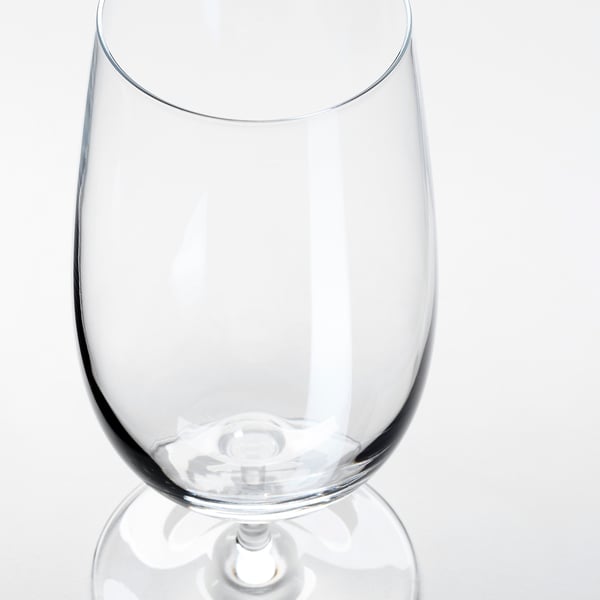A clear, sleek wine glass with a smooth stem, reflecting light, set against a white background.
