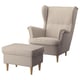 STRANDMON wing chair and footstool. Beige striped fabric, wooden legs. Chair has high back, rolled arms. Footstool is cushioned.
