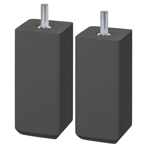 Two STUBBARP legs in dark grey. These are square, wooden furniture legs with adjustable screws for levelling. They have a sleek, minimalist design.