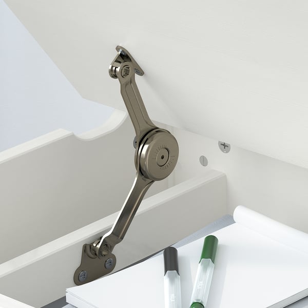 Metal lid support on desk, keeps lid open safely. Part of SUNDVIK childrens furniture series.