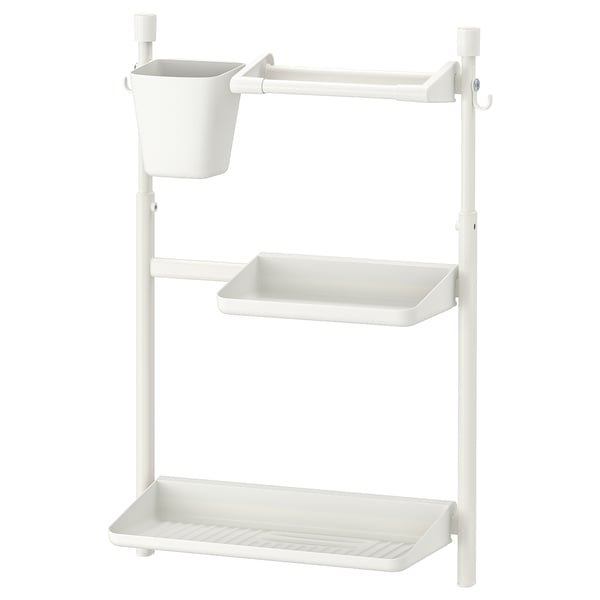 A white SUNNERSTA kitchen rack with multiple shelves and a hanging basket, made of polypropylene plastic, designed for efficient storage and draining.