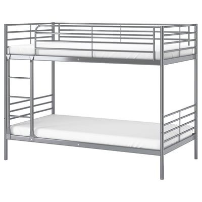 A silver metal SVÄRTA bunk bed. It has a ladder on the side, two white mattresses, and a simple, modern design.