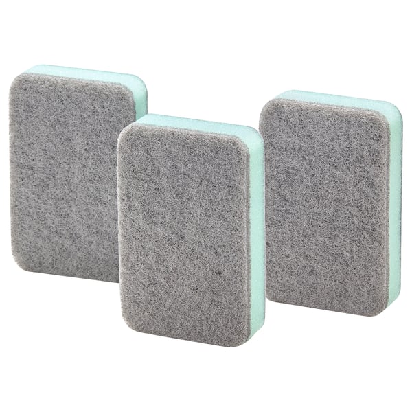 Three gray-green rectangular sponges for cleaning dishes and surfaces.