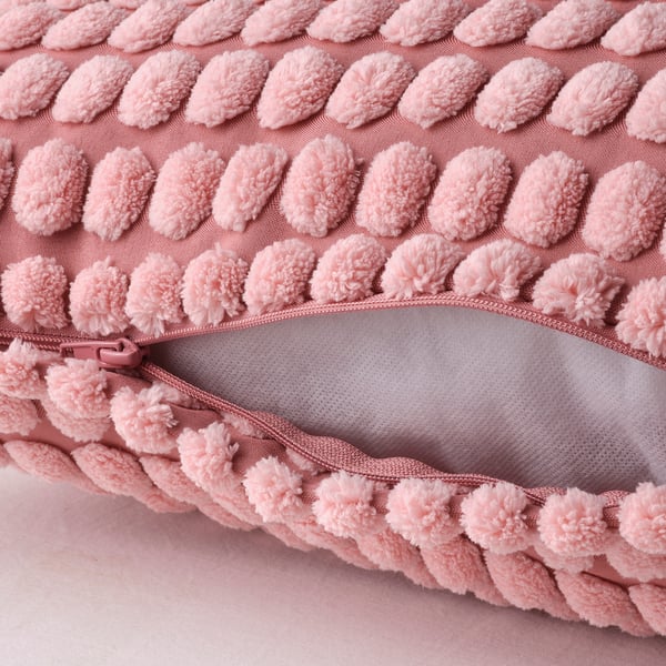 Light pink cushion cover, zip opening, soft textured pattern, recycled polyester.