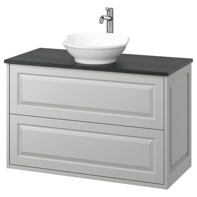 Elegant light grey wall-mounted bathroom vanity with two drawers and a round white sink on a dark countertop.