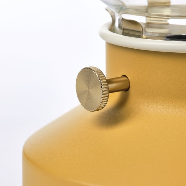 Modern gold lamp with glass and steel.