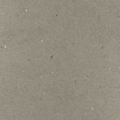 Close-up view of sleek, speckled recycled glass wall panel.