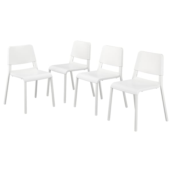 Four white stackable chairs, modern design with plastic seats and metal legs.