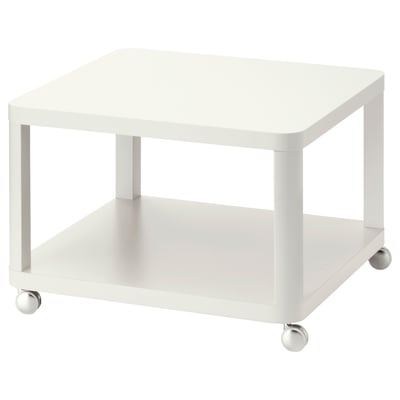 White rolling side table with two shelves, featuring four chrome casters for easy mobility. Modern minimalist design with clean lines.