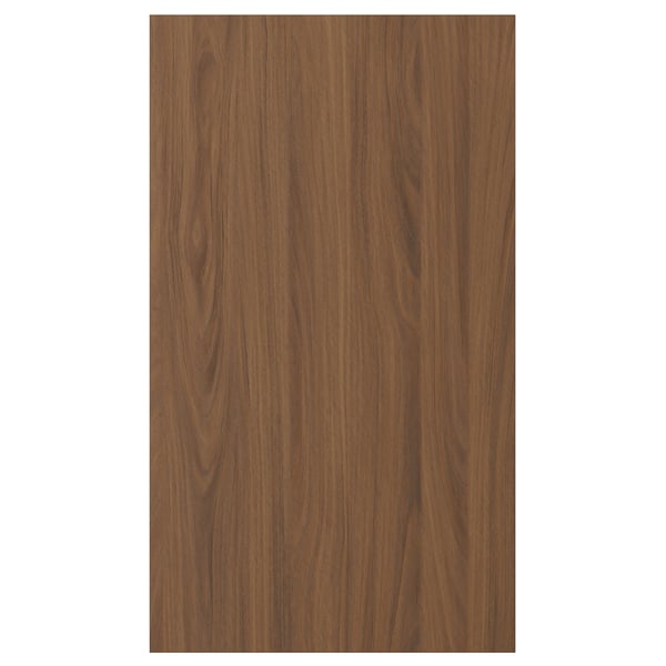 A TISTORP door front with a walnut finish, smooth texture, and classic design. Rectangular, made of particleboard with plastic edging.