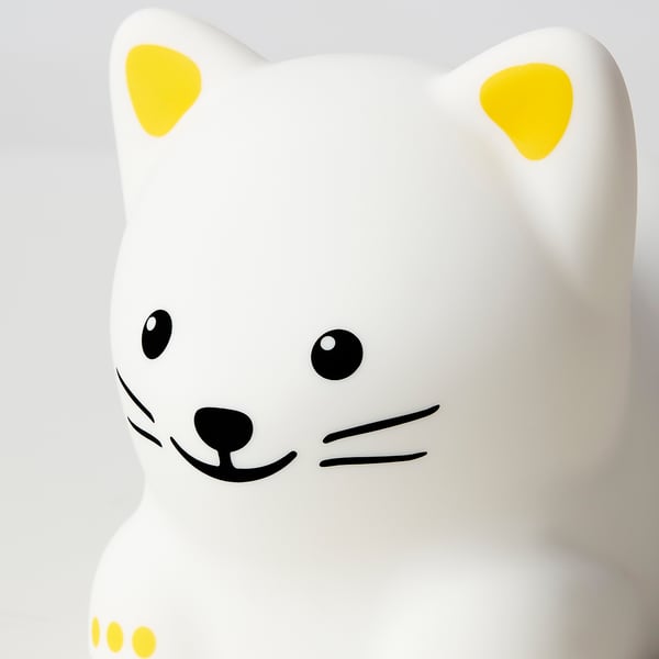 Cute, white cat night lamp with yellow ears and black eyes, made of durable plastic.