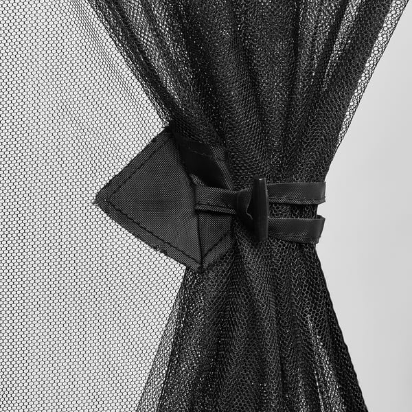 Black mesh net with straps and buckles, likely part of a TORPÖN insect protection system for a parasol.