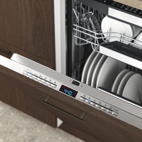 Built-in dishwasher control panel displaying digital time, with multiple programme options for efficient dishwashing.