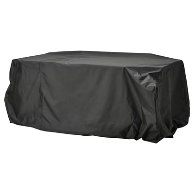 A black TOSTERÖ outdoor furniture cover. Its waterproof, rectangular, and made of polyester with polyurethane coating for protection.