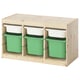 An ikea TROFAST storage unit in light pine with green and white plastic boxes, featuring an open and modular design.