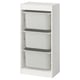 A white TROFAST storage unit with three removable gray bins for organizing items.