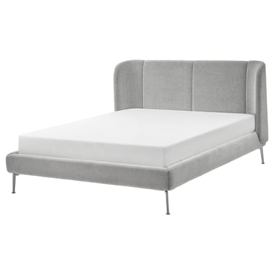 Modern grey upholstered bed, curved headboard, steel legs.
