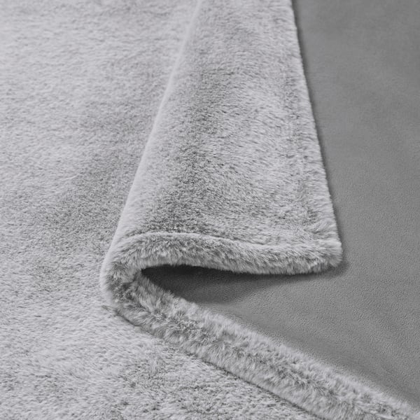 Grey furry recycled polyester blanket.