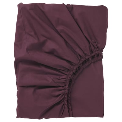 A maroon fitted sheet with elastic edges, made from cotton and lyocell. It has a crisp, smooth surface, designed for mattresses up to 26 cm thick.
