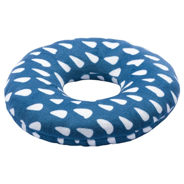 The UTSÅDD dog toy is a blue circular cushion with white irregular patterns, made from recycled polyester fabric and filling.