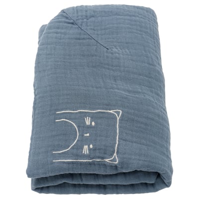 Folded blue organic cotton baby mat cover with white embroidered cat.