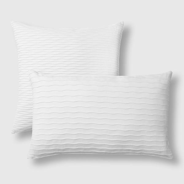Plush pillows with cotton-velvet covers, down-filled for softness.