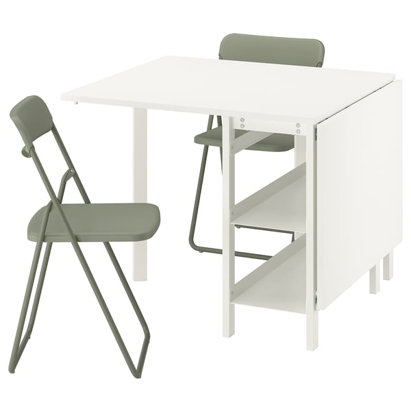 Foldable dining table with green chairs, minimalist design. Character count: 47