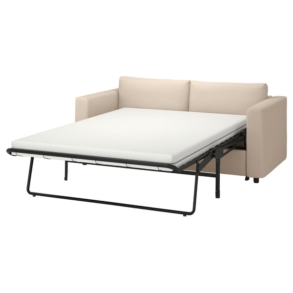 VIMLE beige sofa-bed, modern design, featuring a soft fabric cover, metal frame support, and convertible sleeper function.