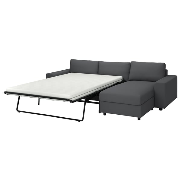 A dark grey VIMLE sectional sofa-bed with a pull-out bed and storage chaise longue.