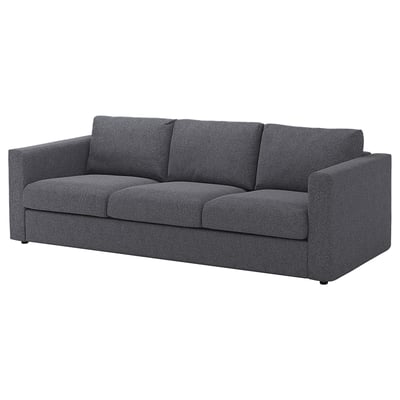 The VIMLE sofa is a modern, dark gray, three-seater with boxy cushions and clean lines, made from durable polyester fabric.