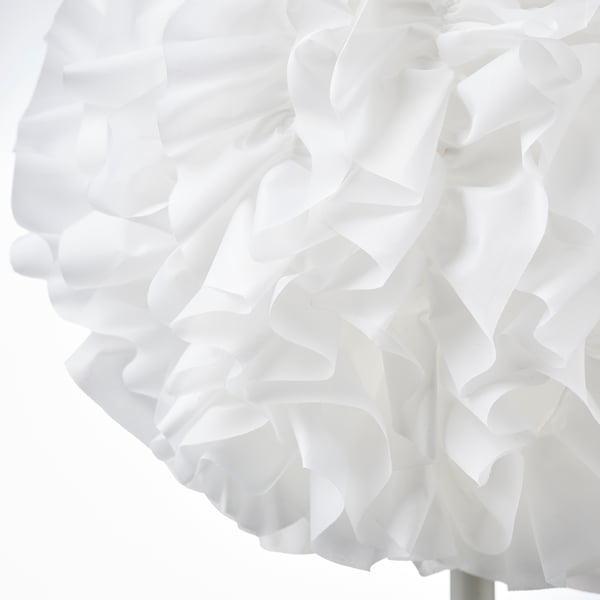 Cloud-like lamp with intricate white polyester design, emitting soft mood light.