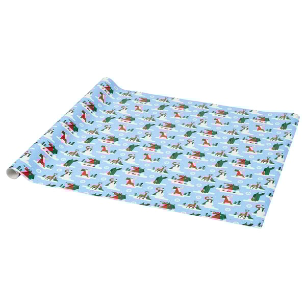 Light blue gift wrapping paper with repeating holiday graphics. Santa, reindeer, and trees on light blue background.