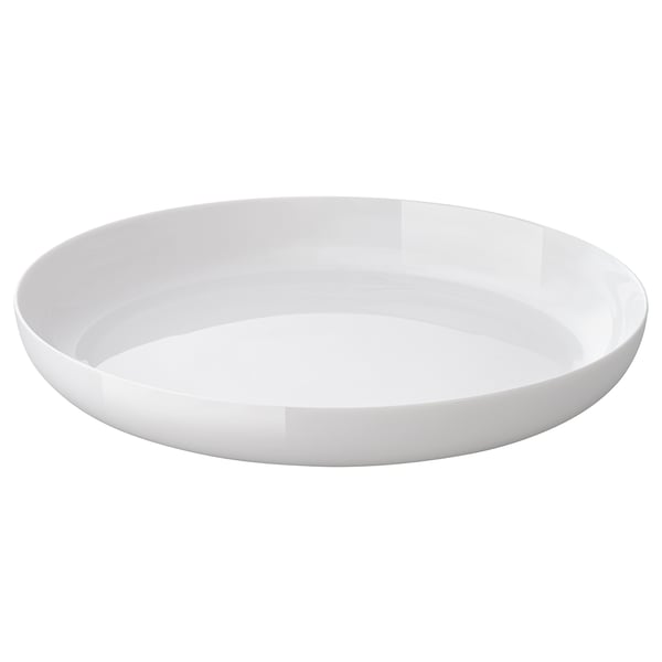 A white, round, opaque glass plate. It has a smooth, elegant design and is both dishwasher and microwave safe.