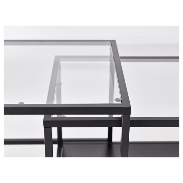 Adjustable glass table with metal frame