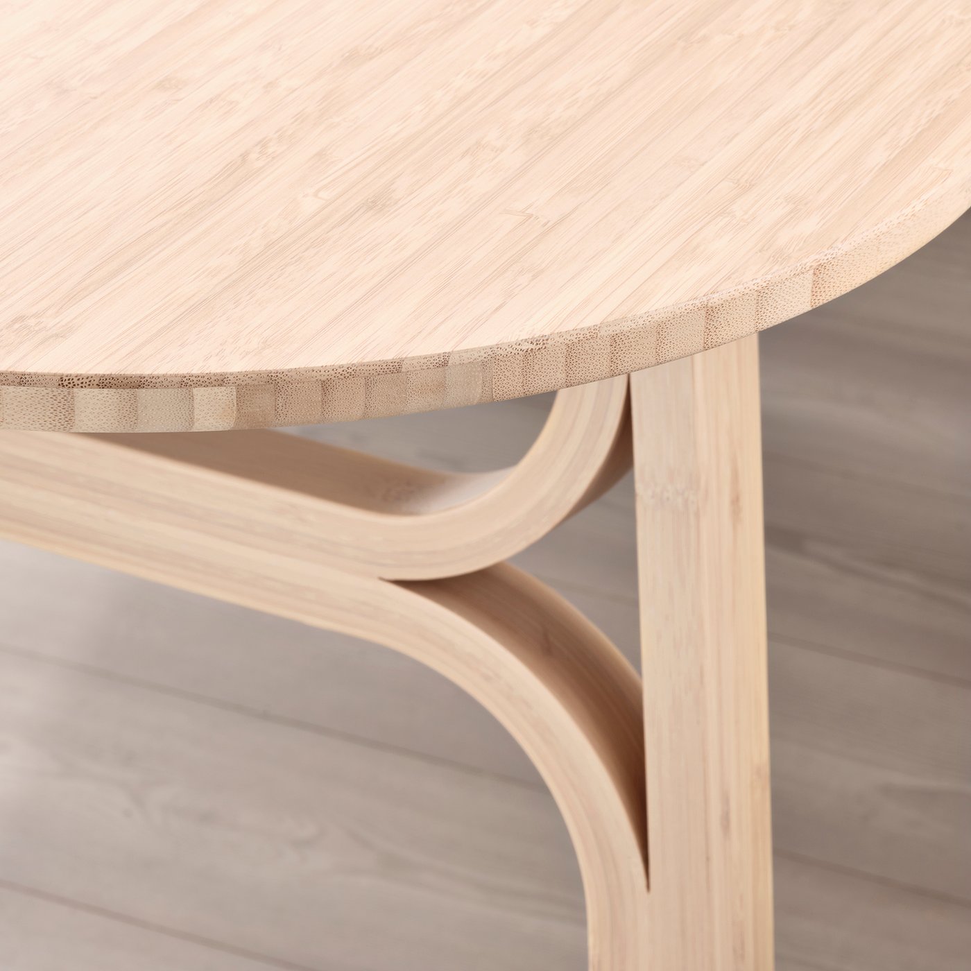 Modern bamboo table with smooth, rounded edges and sleek design, highlighting high-quality craftsmanship and sturdy legs.