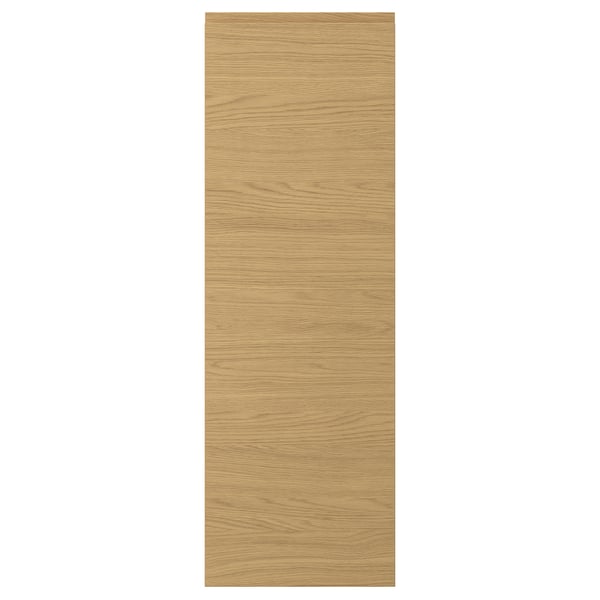 VOXTORP oak cabinet door. Modern, smooth design. Integrated handles. Warm, natural wood look.