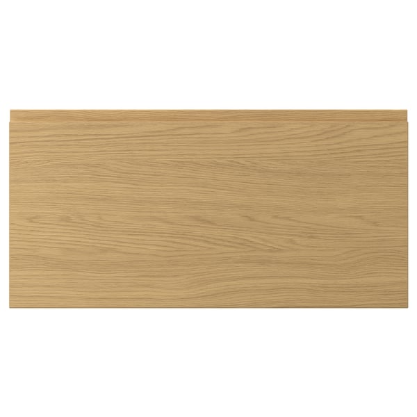 VOXTORP oak drawer front. Modern, smooth design with integrated handles.