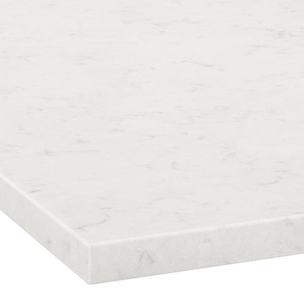 A smooth, white marble countertop with subtle grey veining, reflecting high-quality material and polished finish.