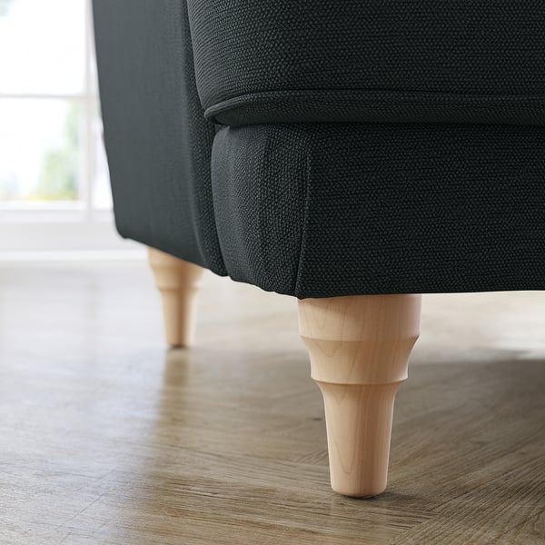 Lähivõte tumehallidest ESSEBODA diivanijalgadest, hele puit, pehme tekstuur.